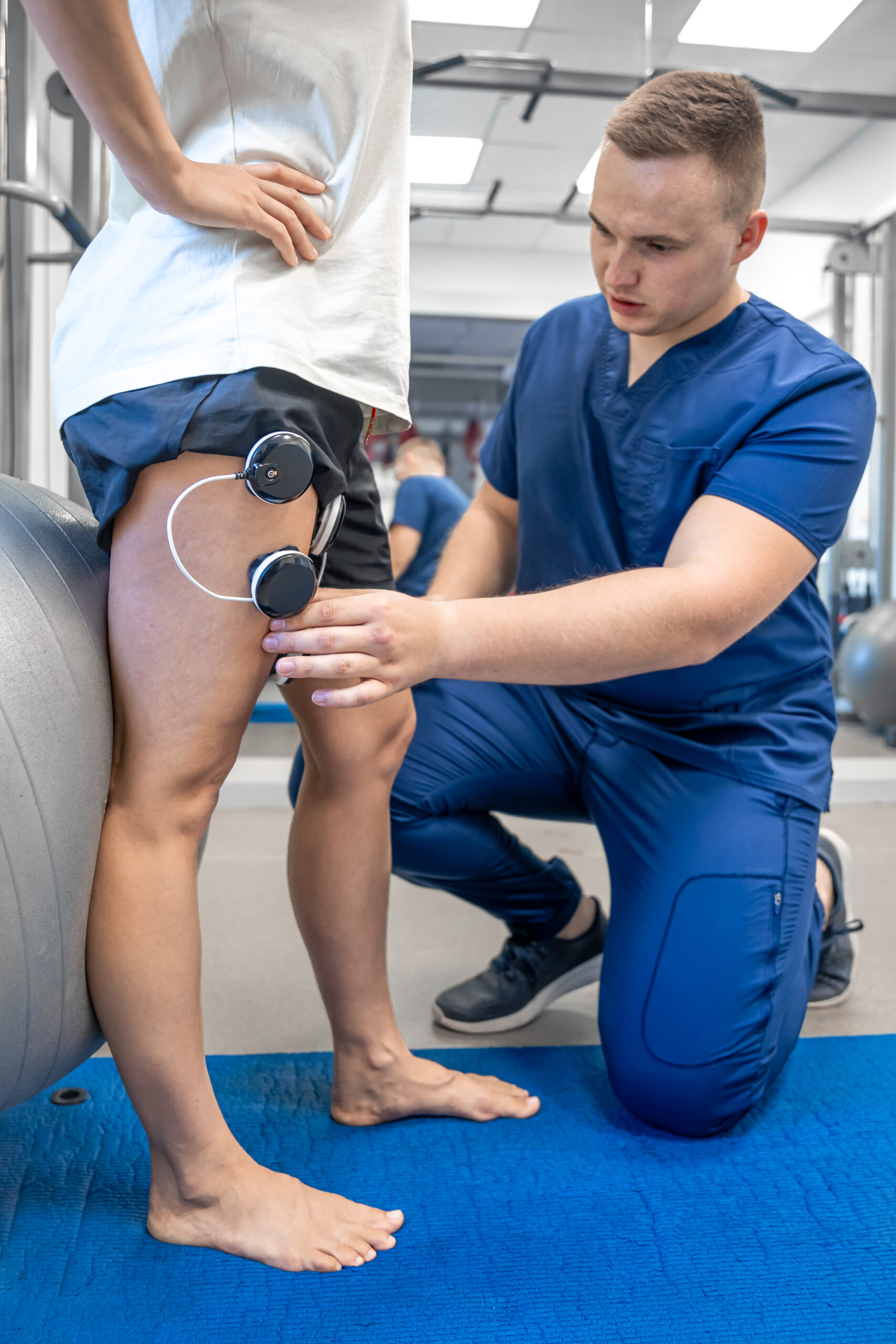 procedure myostimulation legs woman scaled